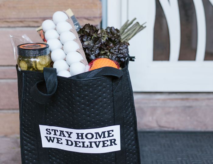 A packed grocery bag ready for delivery