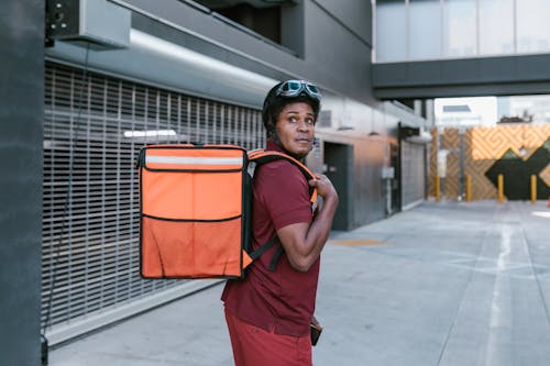 Man Carrying a Delivery Bag