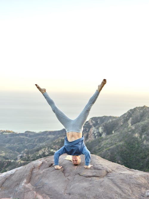 A Woman Doing a Headstand