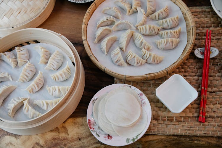 Chicken Momo Served In Wooden Boxes