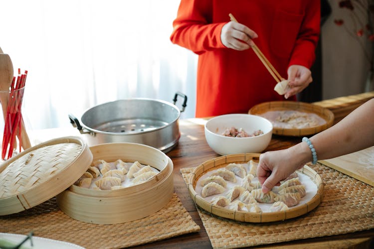 Crop Women Preparing Dim Sum At Home