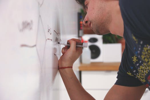 Free stock photo of man, whiteboard, handwriting, marker