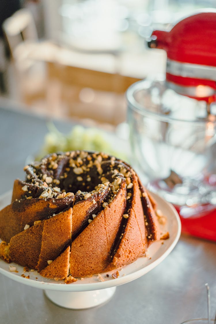 A Chocolate Glazed Budnt Cake With Nuts