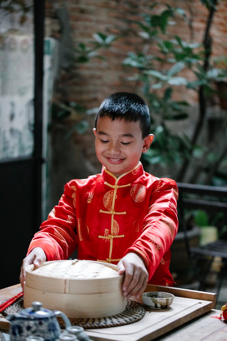 Ethnic Kid With Food Bamboo Steamer