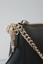 A Black Bag with Gold Chain