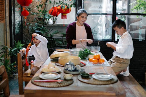 Chinese Family Preparing Food for a Chinese New Year