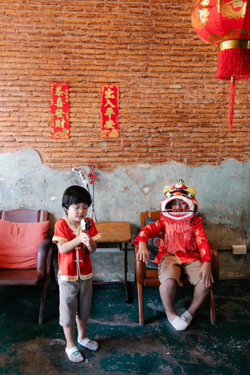 Chinese Kids in Cute Traditional Costumes