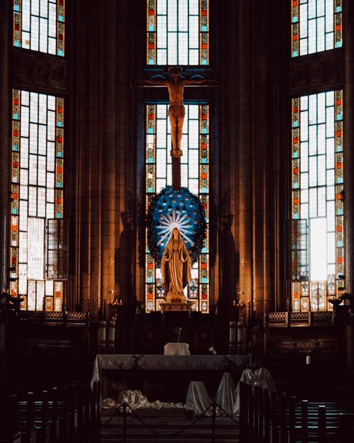 Free Beautiful interior of a church in Istanbul featuring stained glass and religious statues. Stock Photo