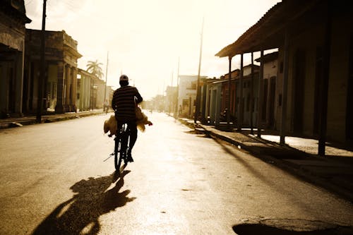 Free Person Riding on Bike Photo Shot during Daylight Stock Photo