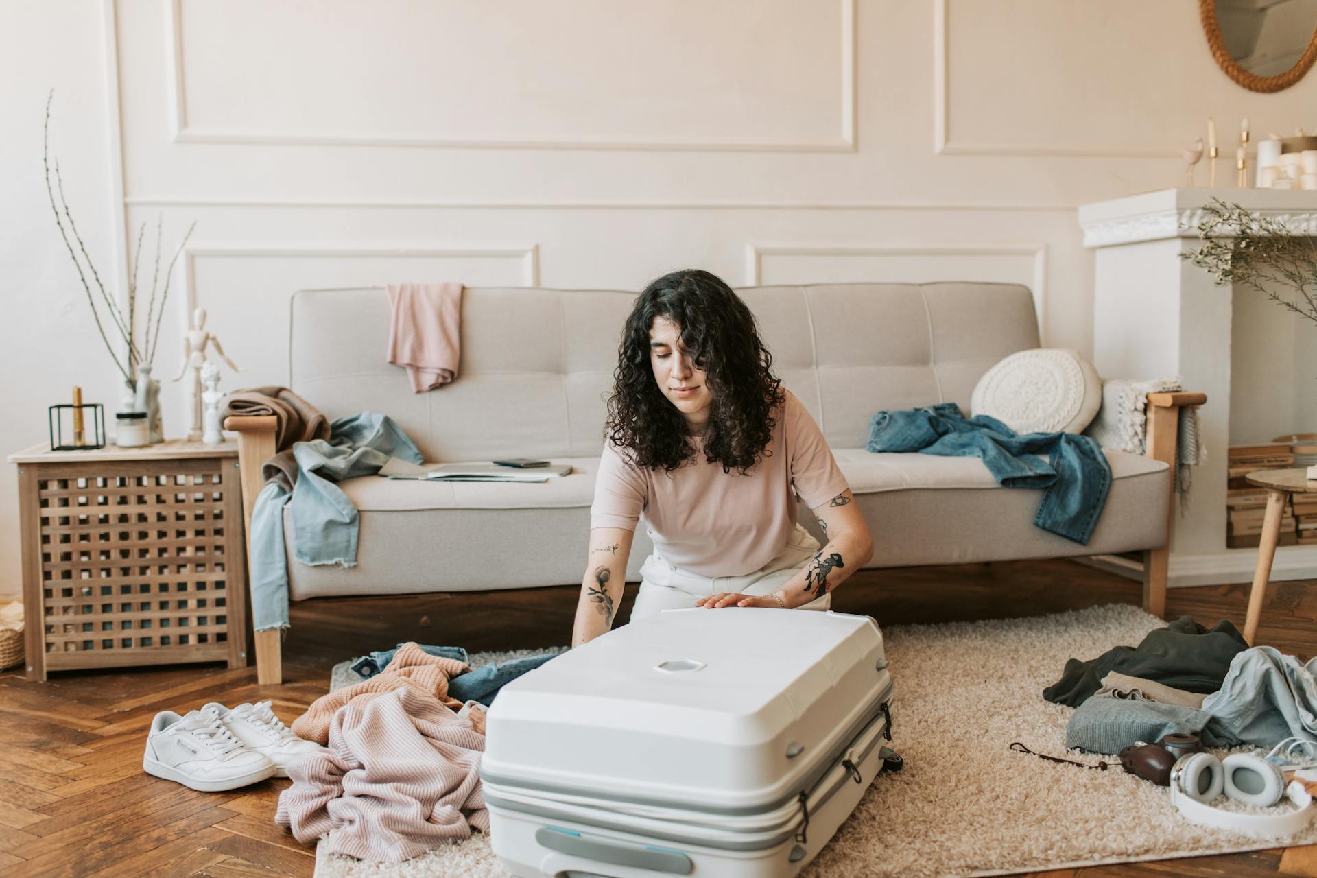 A Woman Packing Her Luggage