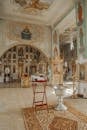 Interior of church with ornamental walls and set for baptism