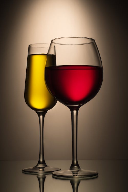 Free White and Red Wine in Clear Glasses Stock Photo