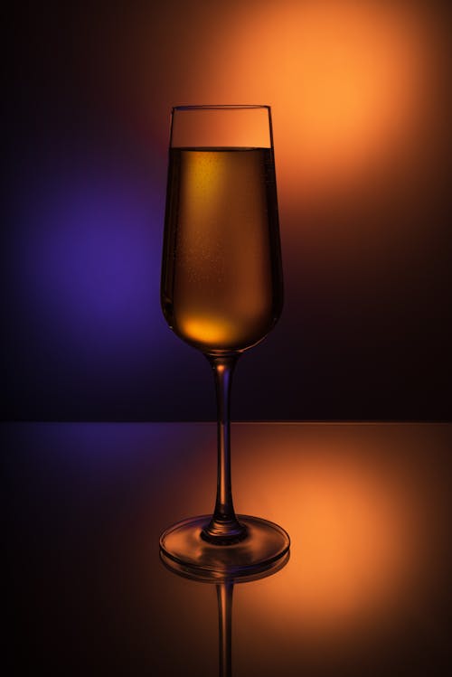 Clear Long Stem Wine Glass With Brown Liquid
