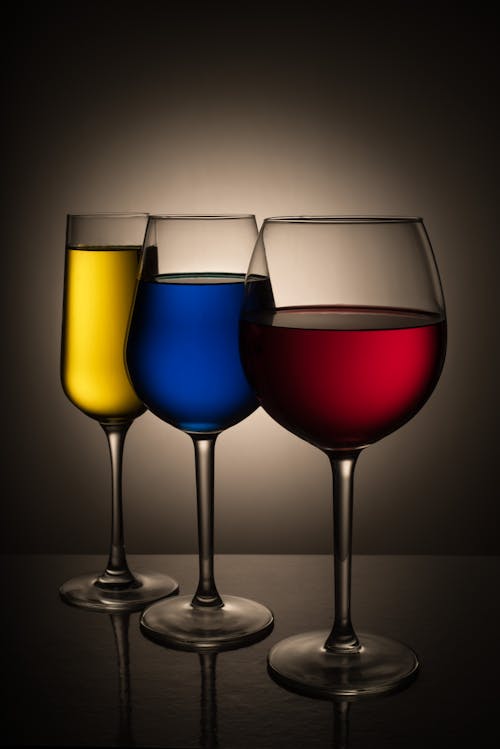 Assorted Bar Glasses with Colored Liquids