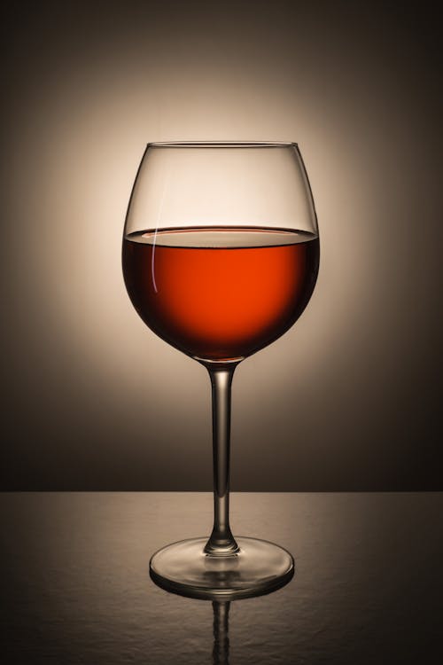 Free Clear Wine Glass With Red Wine Stock Photo