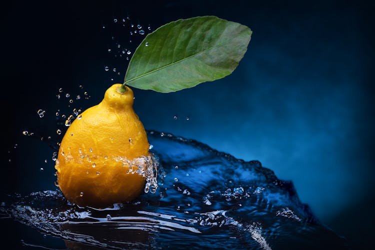 Lemon In Splash Of Water