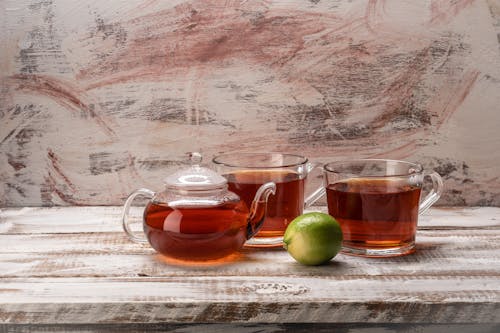 Free Tea in the Clear Glass Cup on the Wooden Surface Stock Photo