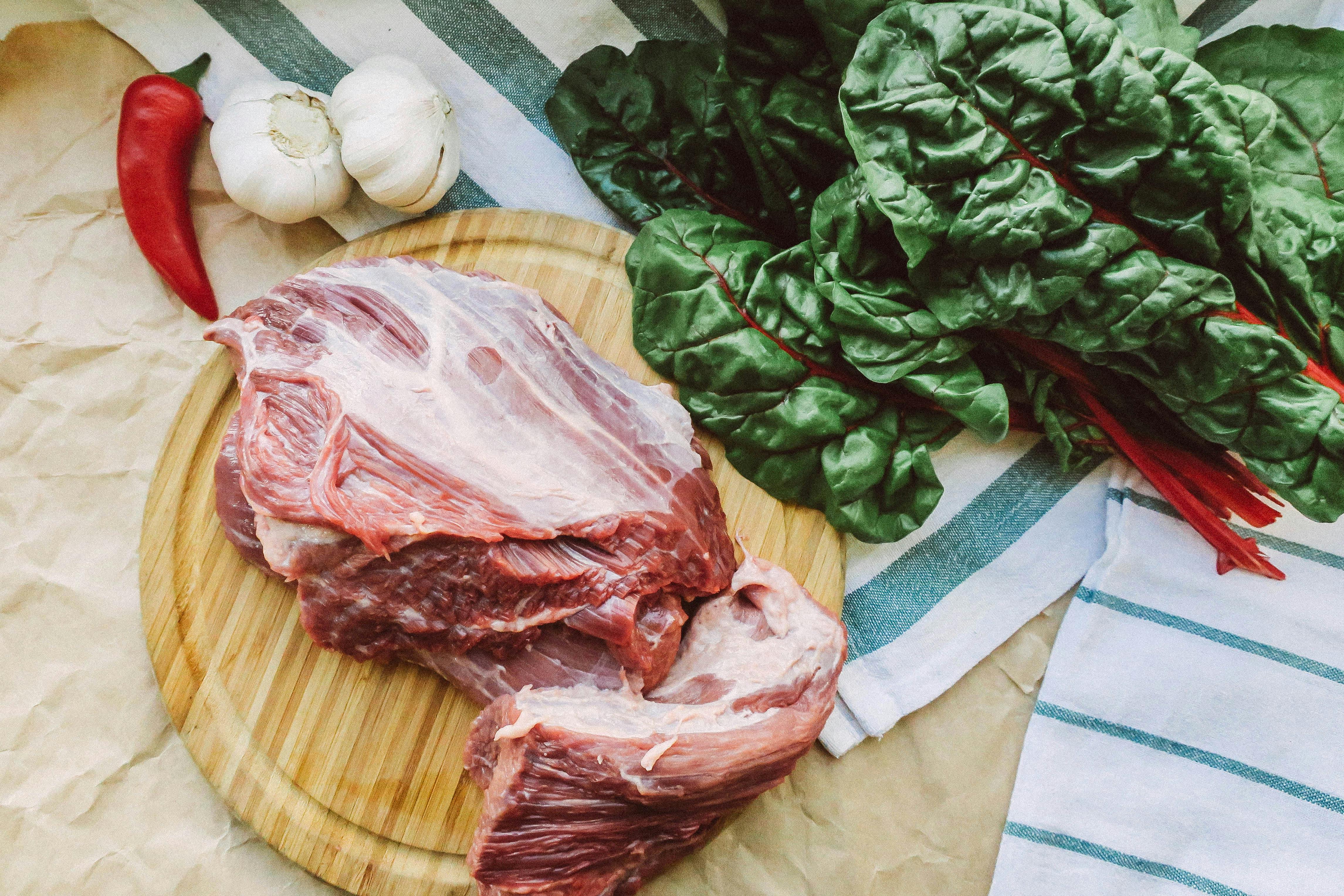 Iron-rich pregnancy foods including lean meat spinach and nutrient-dense meals supporting healthy maternal iron levels