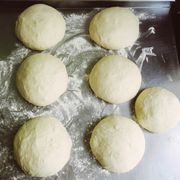 Fresh dough balls resting on a floured surface — Christina Voinova on Pexels