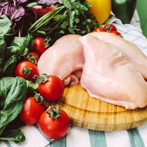 Food Ingredients on Brown Wooden Chopping Board