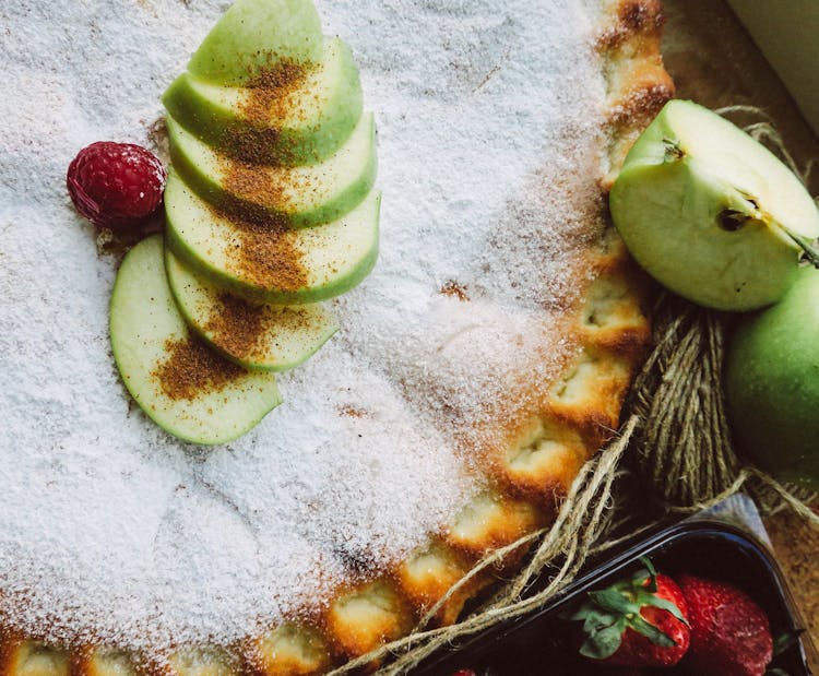 Sliced Apples On Top Of A Pie