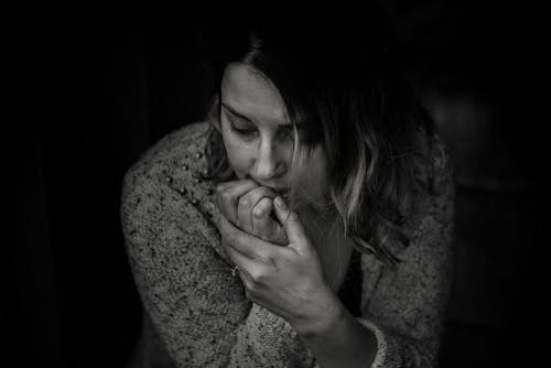 Greyscale Photography of Woman Wearing Long-sleeved Top