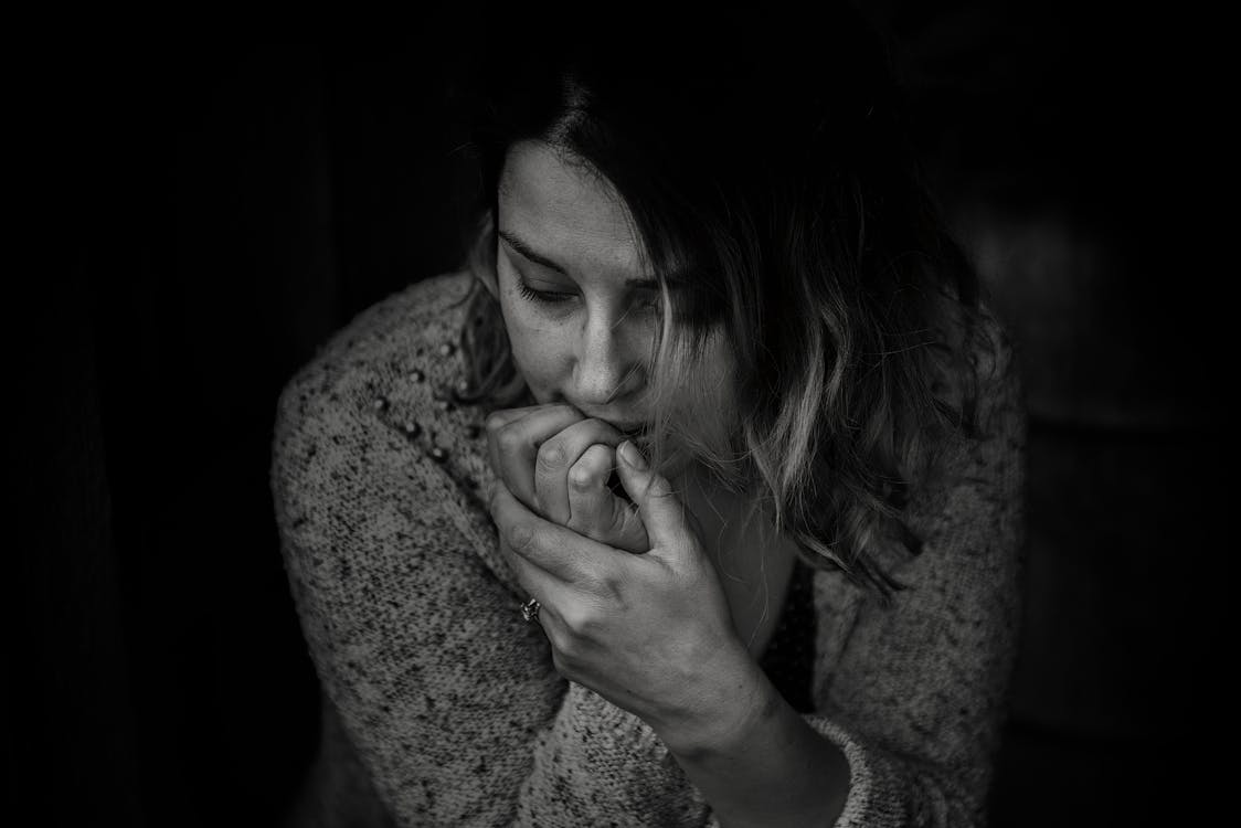 Greyscale Photography of Woman Wearing Long-sleeved Top