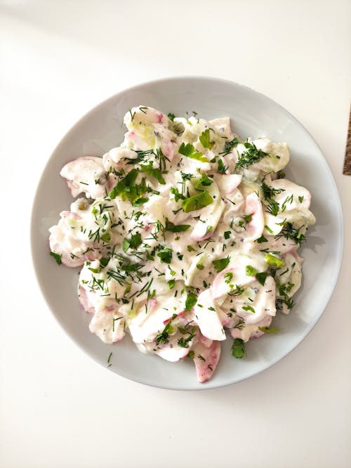 A Salad with Herbs on a Plate