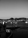 Grayscale Photo of Boats on Sea