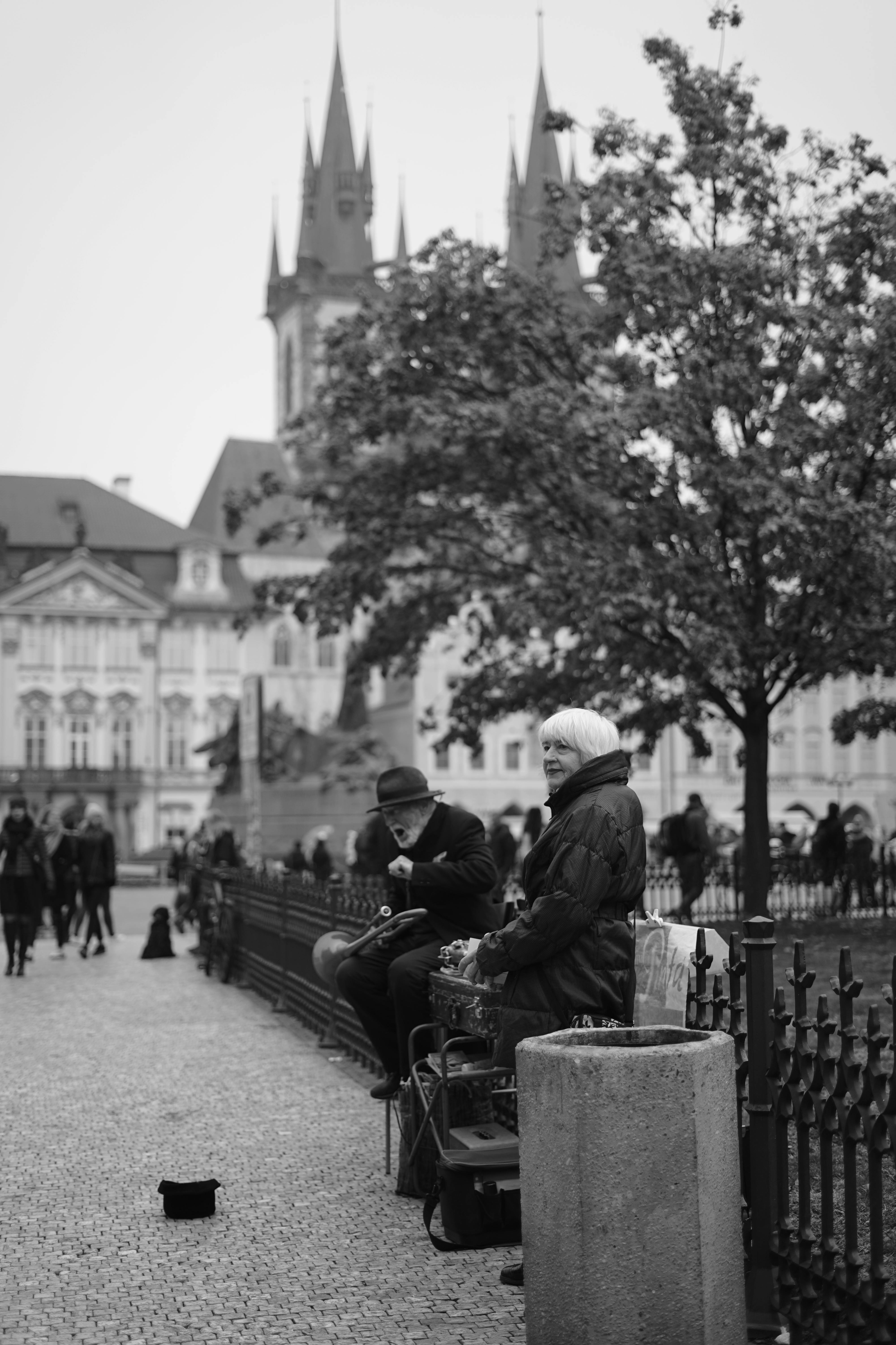 people walking on square in city