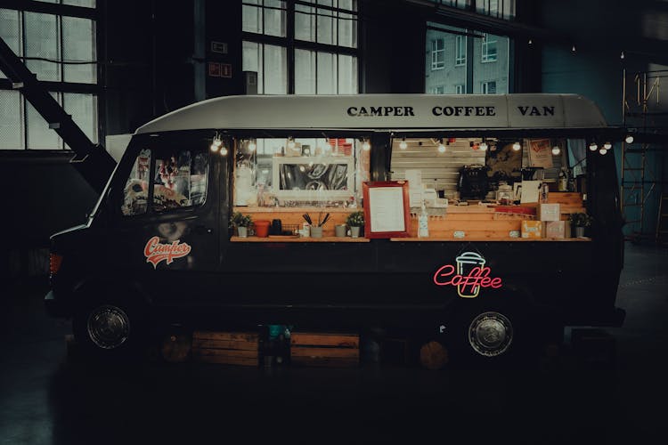 Coffee Van With Glowing Neon Signboard