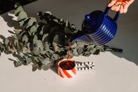 Blue Plastic Bottle With Red Liquid