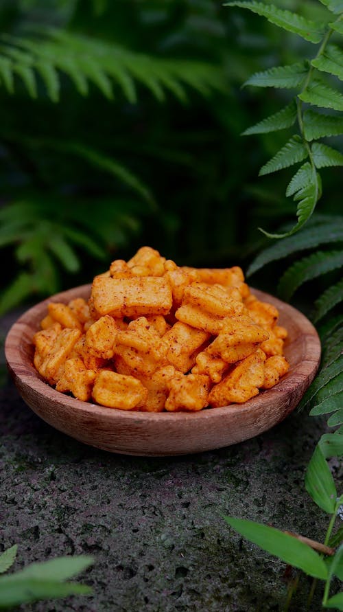 Photo of Chips Near Green Leaves