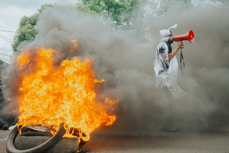 A Person Using A Megaphone