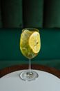 Clear Wine Glass With Sliced Lemon