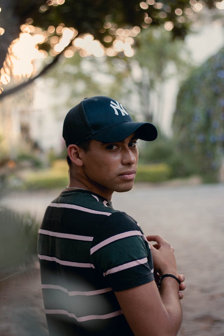 Portrait Of Man Wearing Baseball Hat