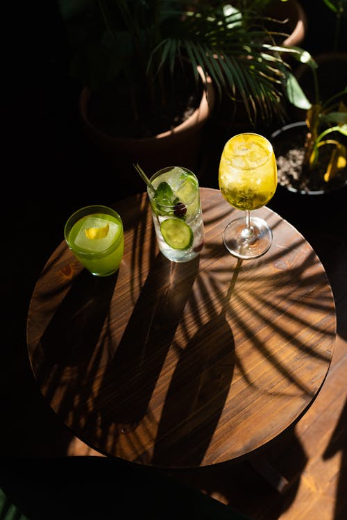 Free Refreshment Drinks on Wooden Table Stock Photo