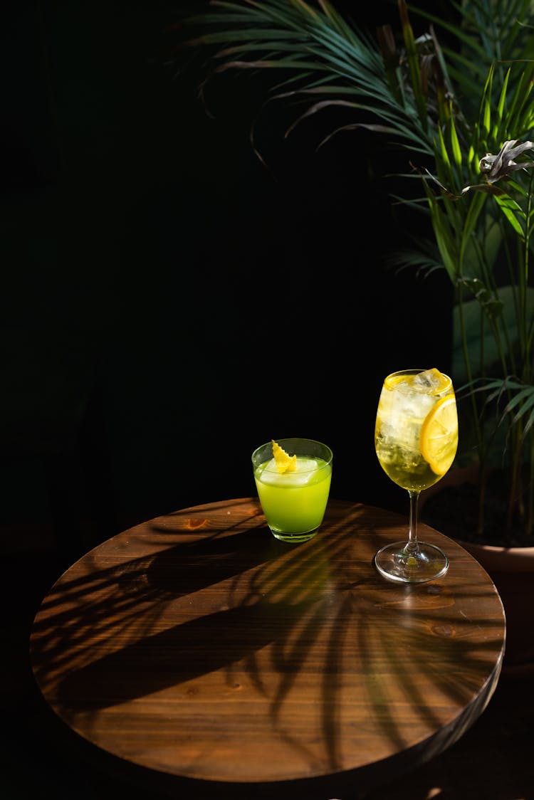 A Cocktails Drinks On A Wooden Table