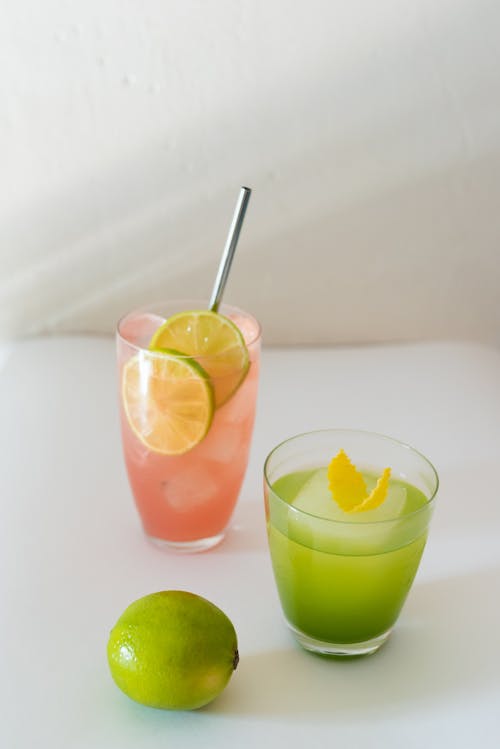 Cocktails Beside a Lime Fruit