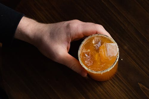 Orange Cocktail Drink with Ice Cubes