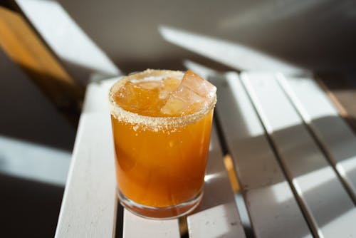 Close-Up Shot of an Alcoholic Beverage on a Shot Glass