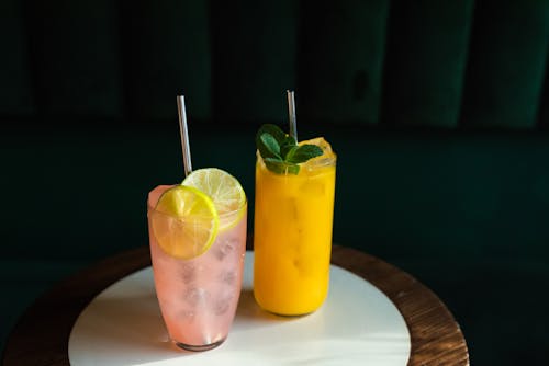 Free Close-Up Shot of Cocktail Drinks on a White Surface Stock Photo