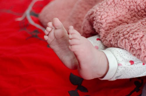 Free Close-Up Shot of a Baby's Feet Stock Photo