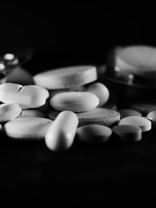 Grayscale Photo of Medicines and Drugs