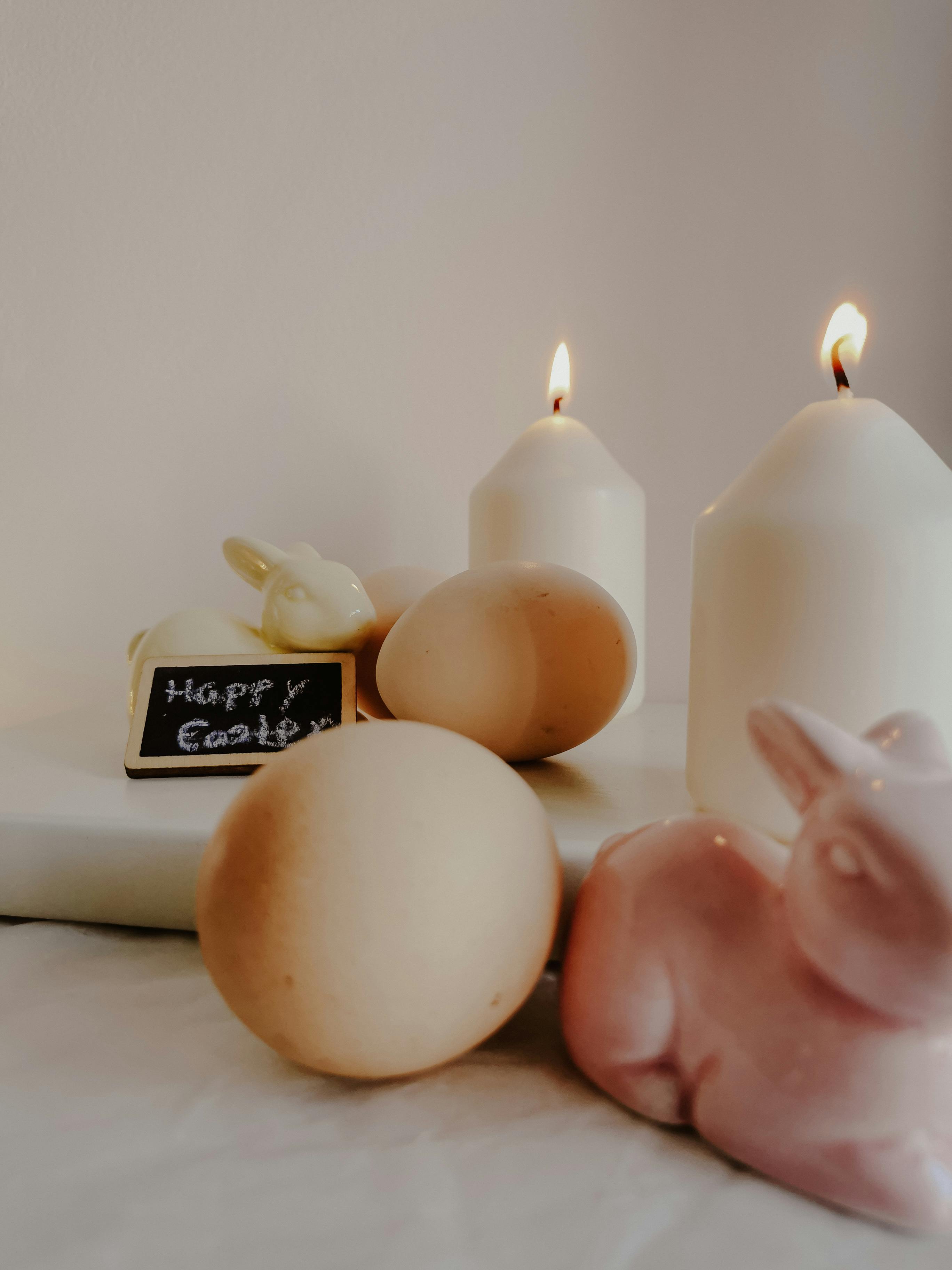 white candles on white surface