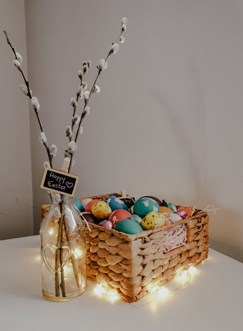 Free Easter Eggs on Brown Woven Basket Stock Photo