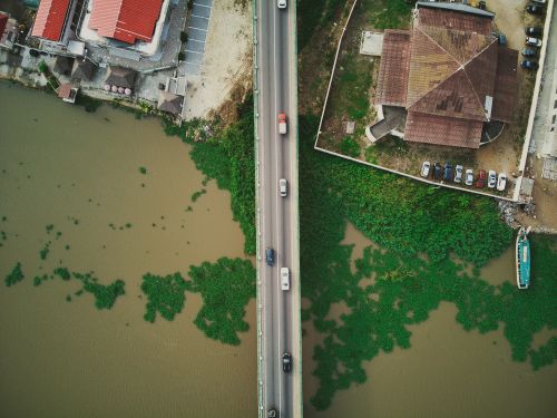 Free Aerial shot of a bridge with flowing traffic in Grand-Bassam, Côte d'Ivoire. Stock Photo