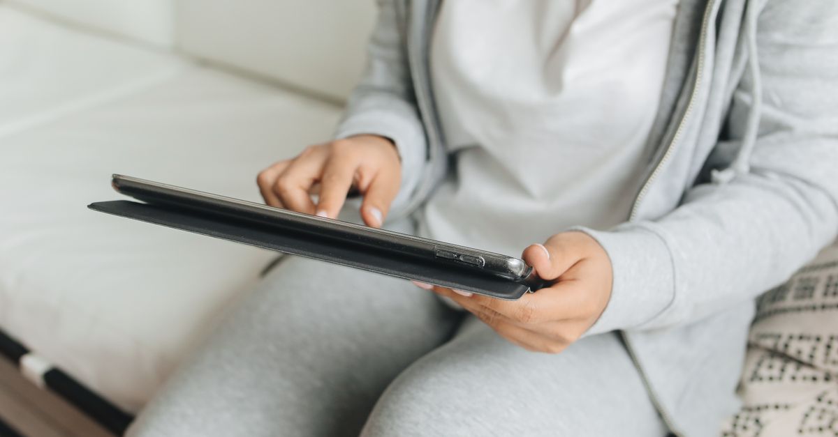 Human Using Tab Close-Up Shot of a Person Using a Tablet · Free Stock Photo