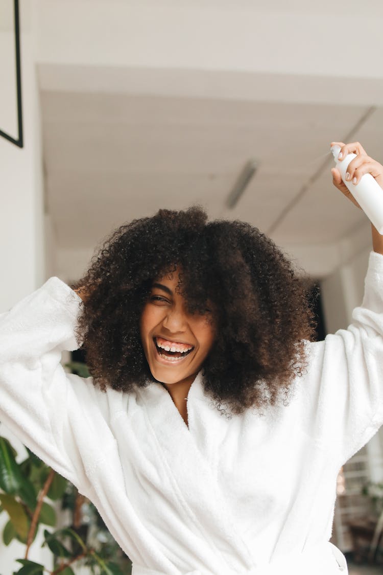 Woman Holding A Hair Spray