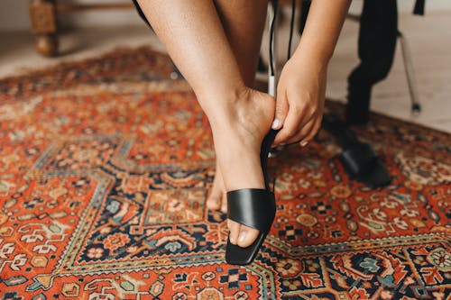 Woman Wearing Black Heels